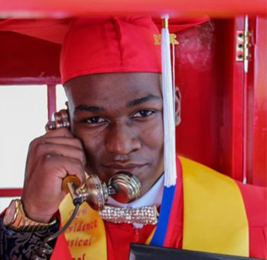 Graduating student on phone